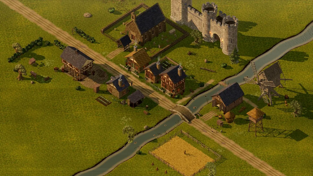 Kit Yard from above: a chapel in its churchyard, cottages along a lane, a stream with a stone bridge, a barn, a post mill and a fenced wheat field